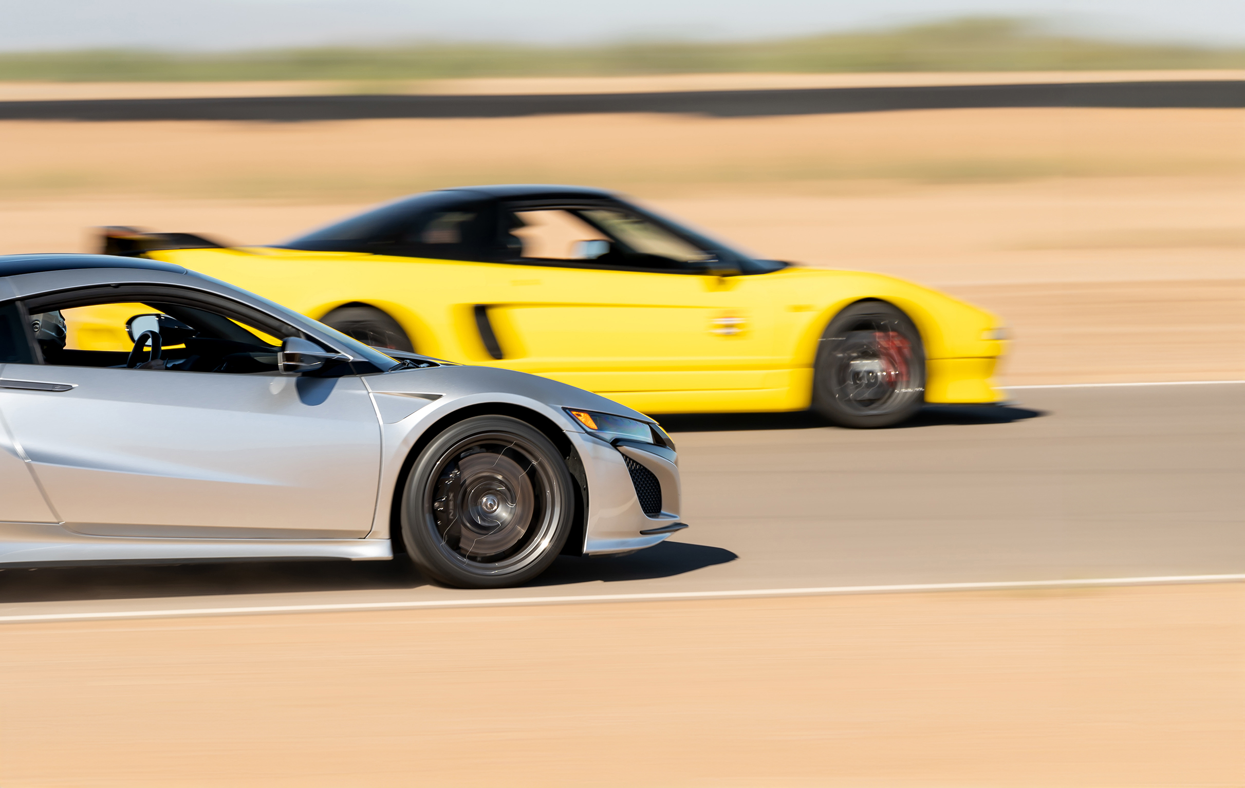 Both NSX generations on the podium